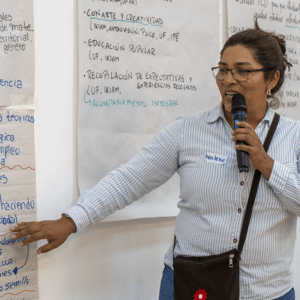 Workshop participant presenting a flipchart she prepared