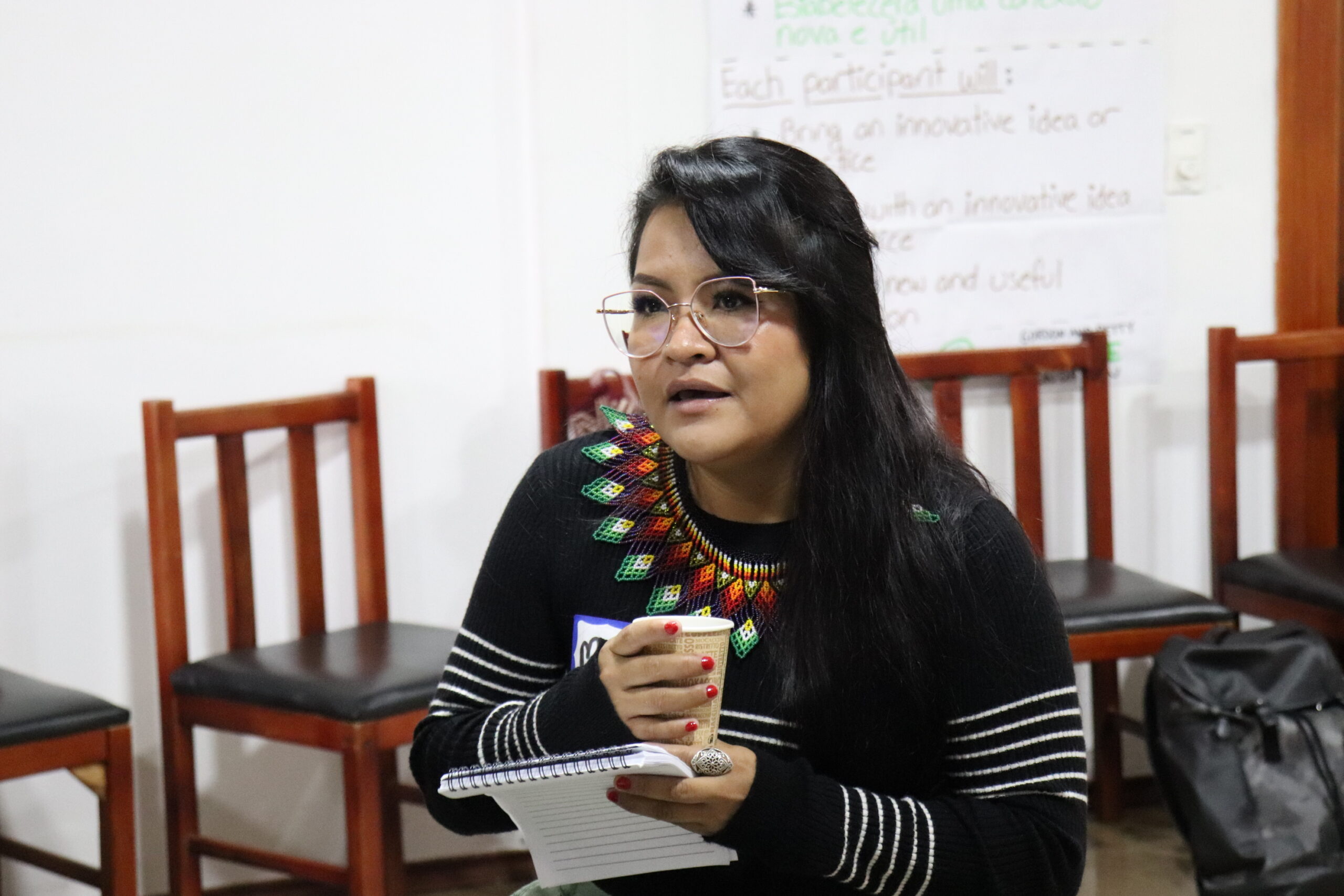 The profile picture of an Indigenous participant speaking to the audience