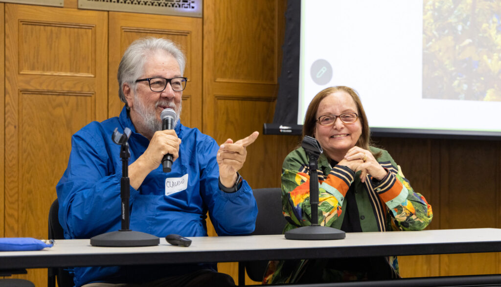 Two conference key note speakers presenting to audience