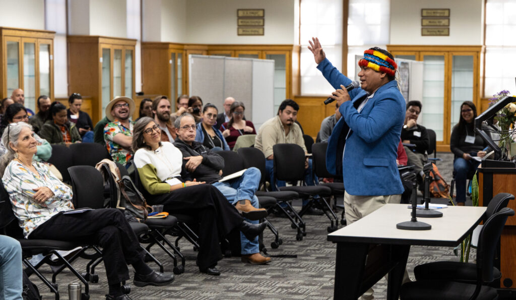 Indigenous presenter Tuntiak Katan presenting to conference audience