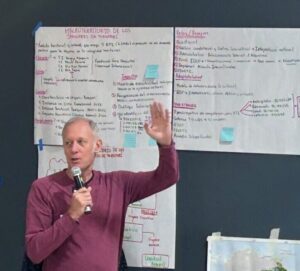 Leonardo Tamborini presenting flipcharts to the audience